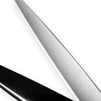 Macro close-up of hand-honed convex edge on InfynitEdge ATS-314 cutting shear blade