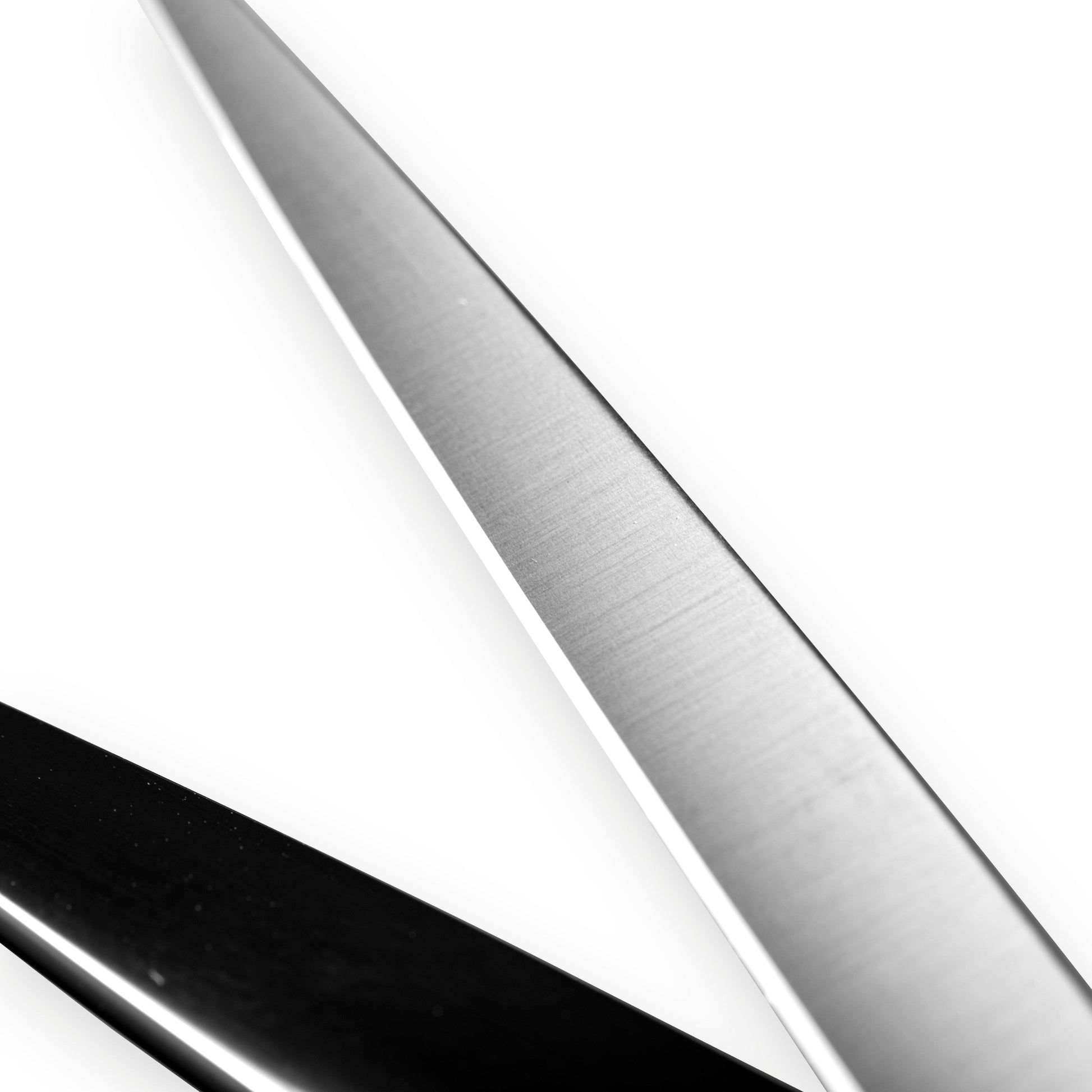 Macro close-up of hand-honed convex edge on InfynitEdge ATS-314 cutting shear blade